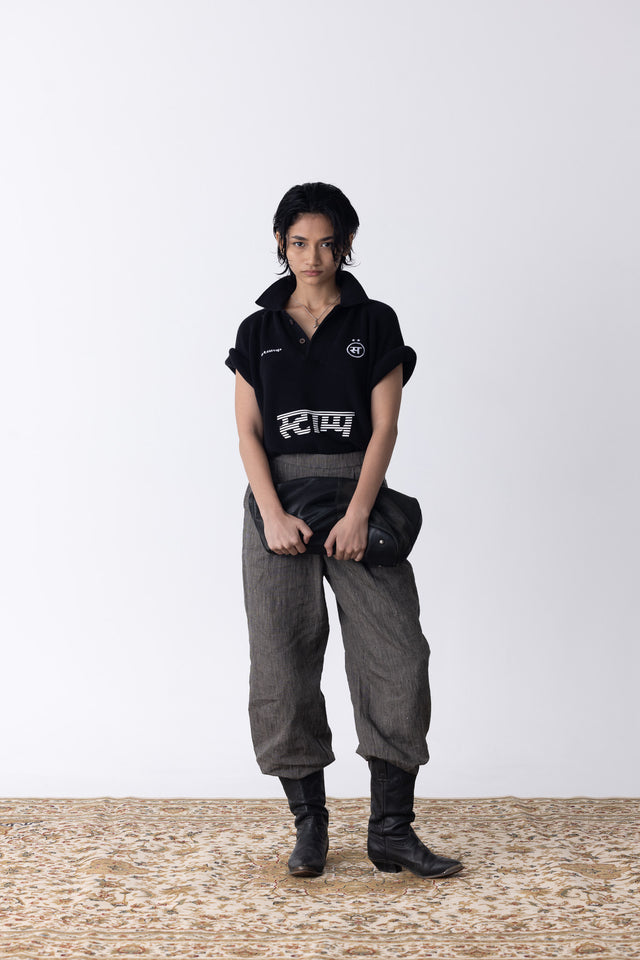 Tuck-Knit Racing Polo in Black