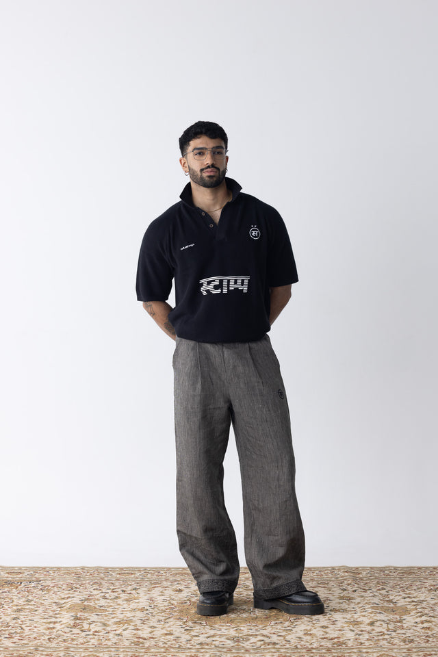 Tuck-Knit Racing Polo in Black