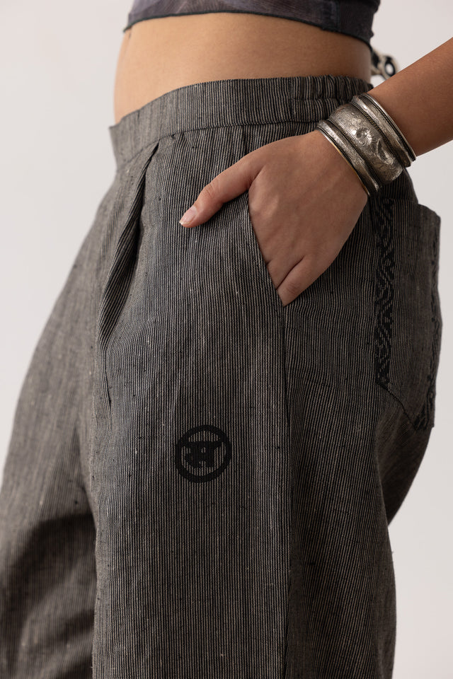 7 Of 7 Block Printed Pleated Linen Pants in Black